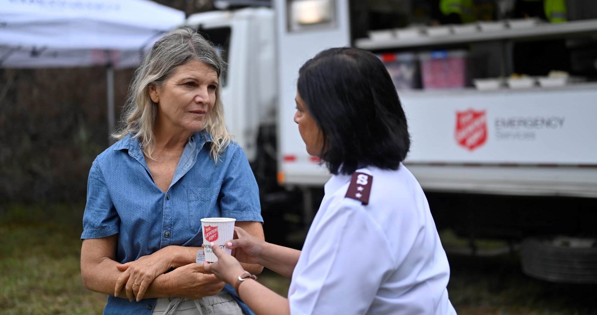 A woman receives care during a flood emergency