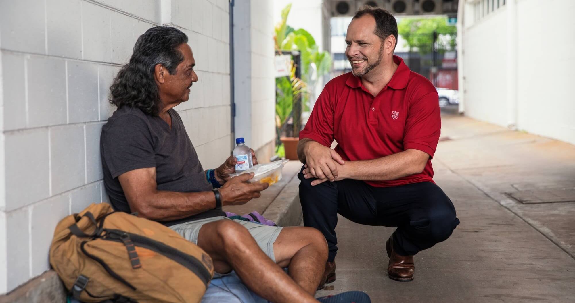 A counsellor works with a client.