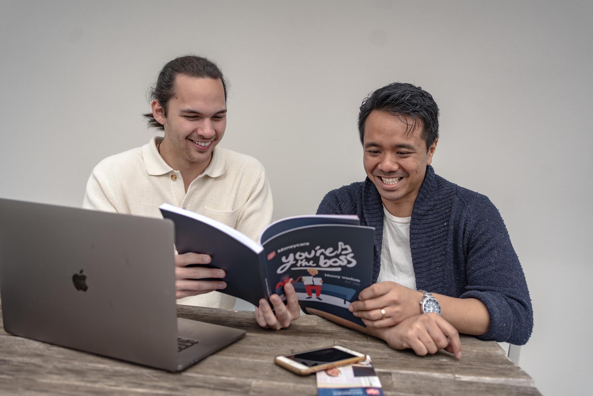 A young man is introduced to some new strategies via the 'You're the Boss' booklet.