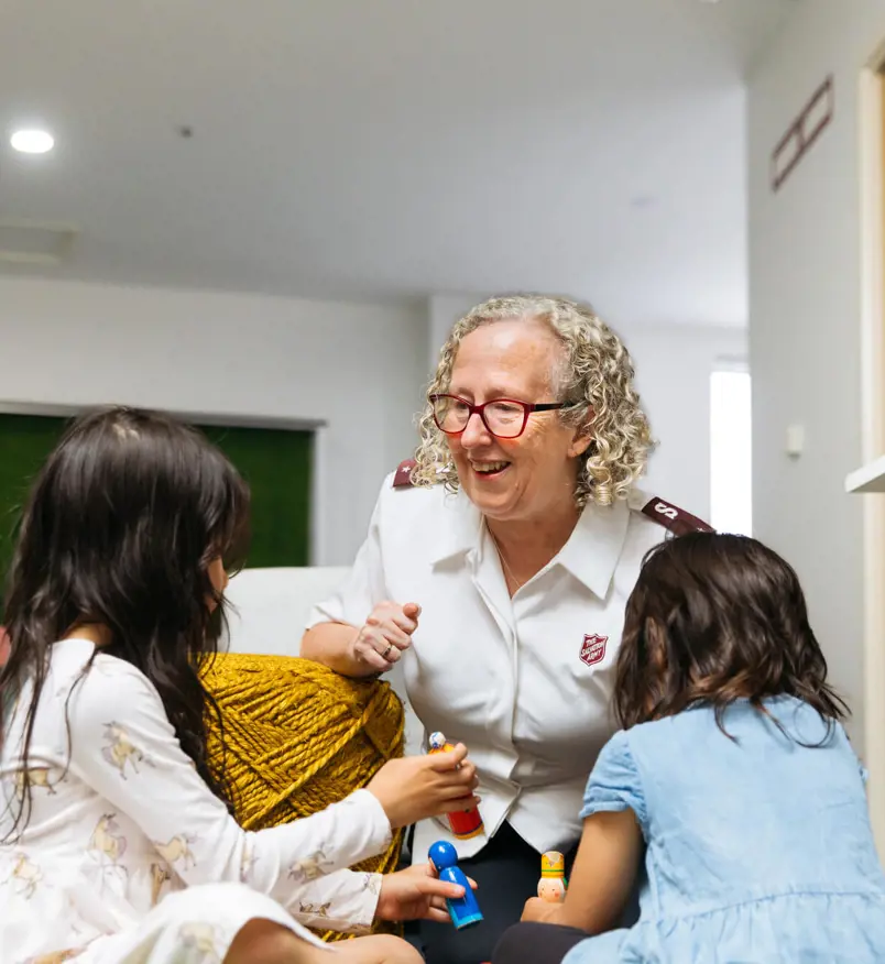 Officer helping children