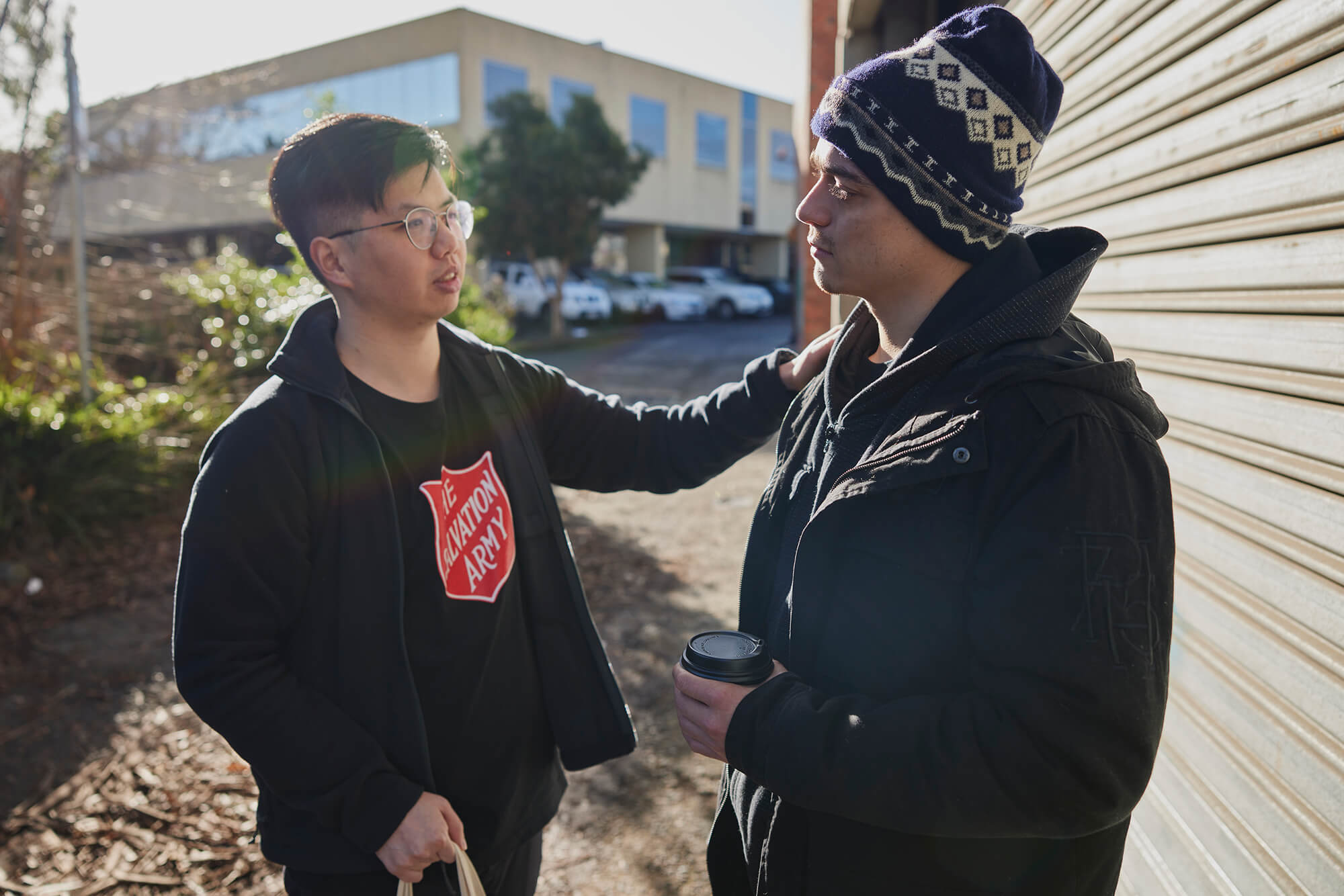 Salvos team member helping an individual