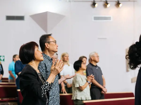 People in worship at a church