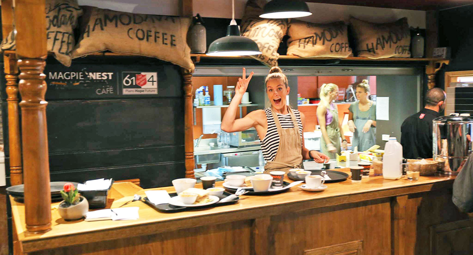 Magpie nest cafe with happy volunteers
