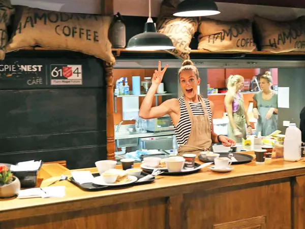 Magpie nest cafe with happy volunteers