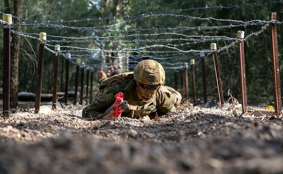 Soldier on the ground while on special forces training.
